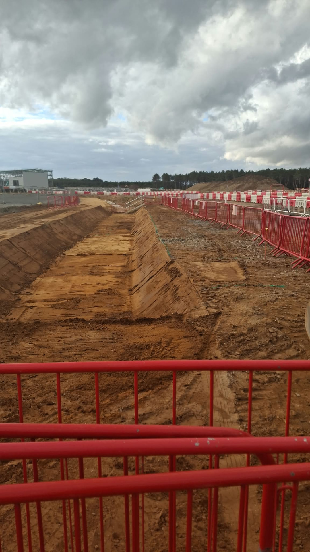 Deep shored drainage trench on a major construction site