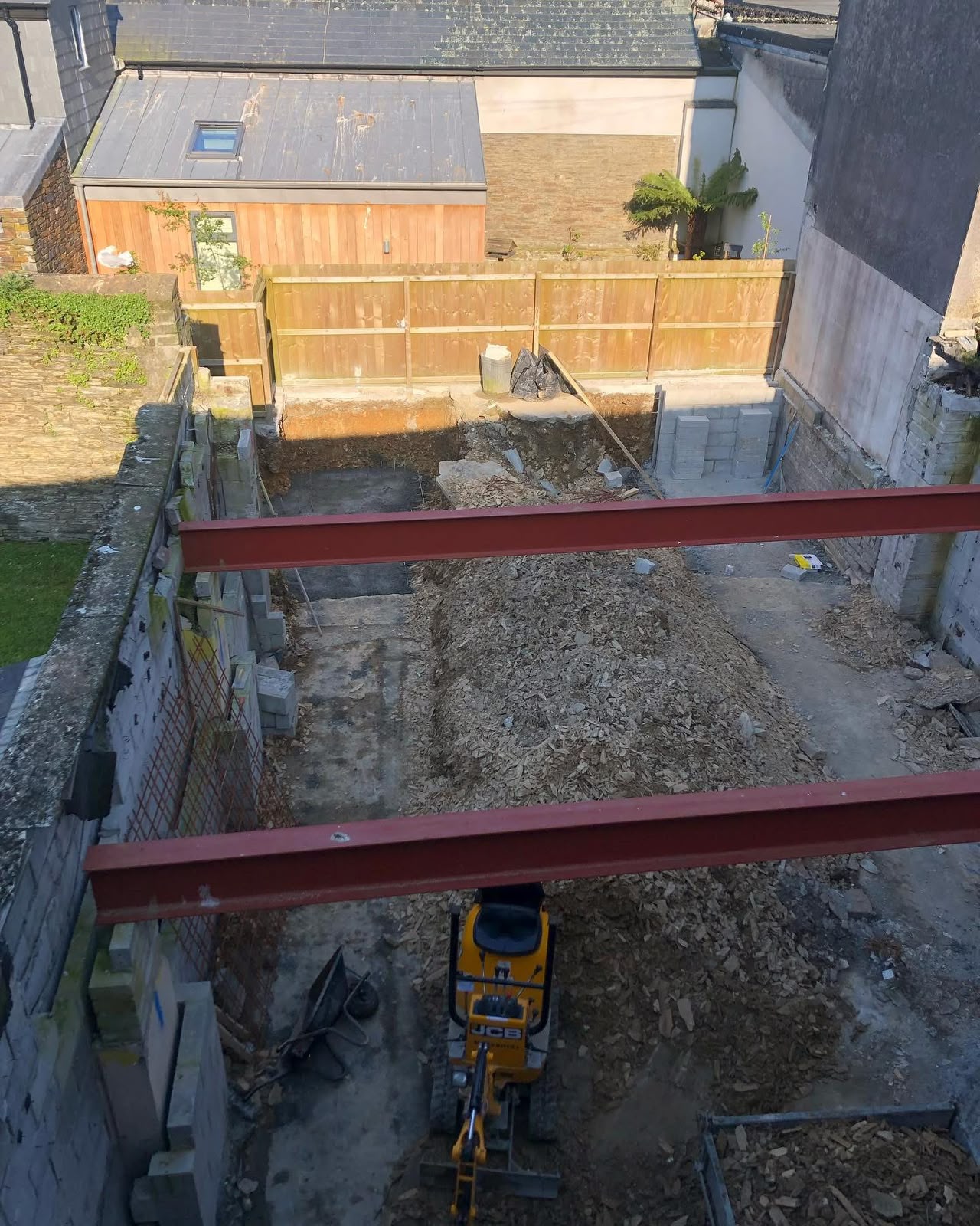 Steel beams installed over an excavated commercial refurbishment site in Cornwall