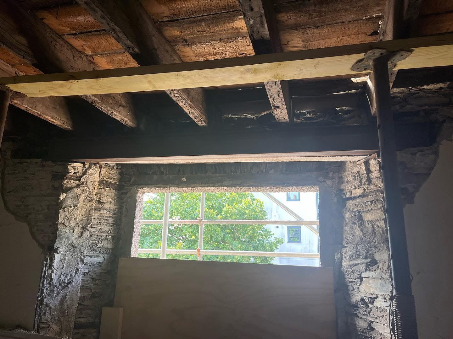 Masonry made good around a replaced lintel on an HMO conversion