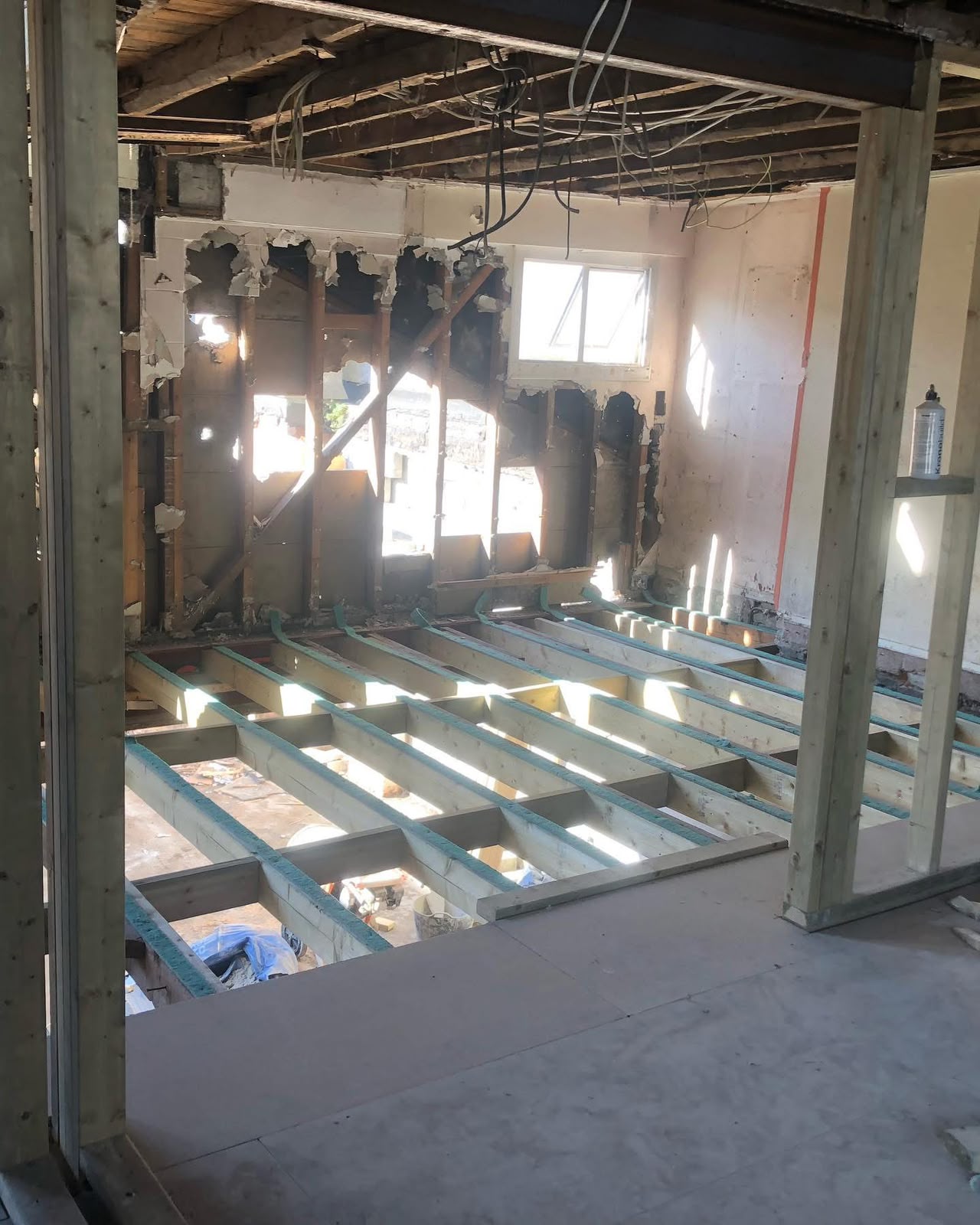 Acoustic sound proofing installed between floor joists on a commercial refurbishment